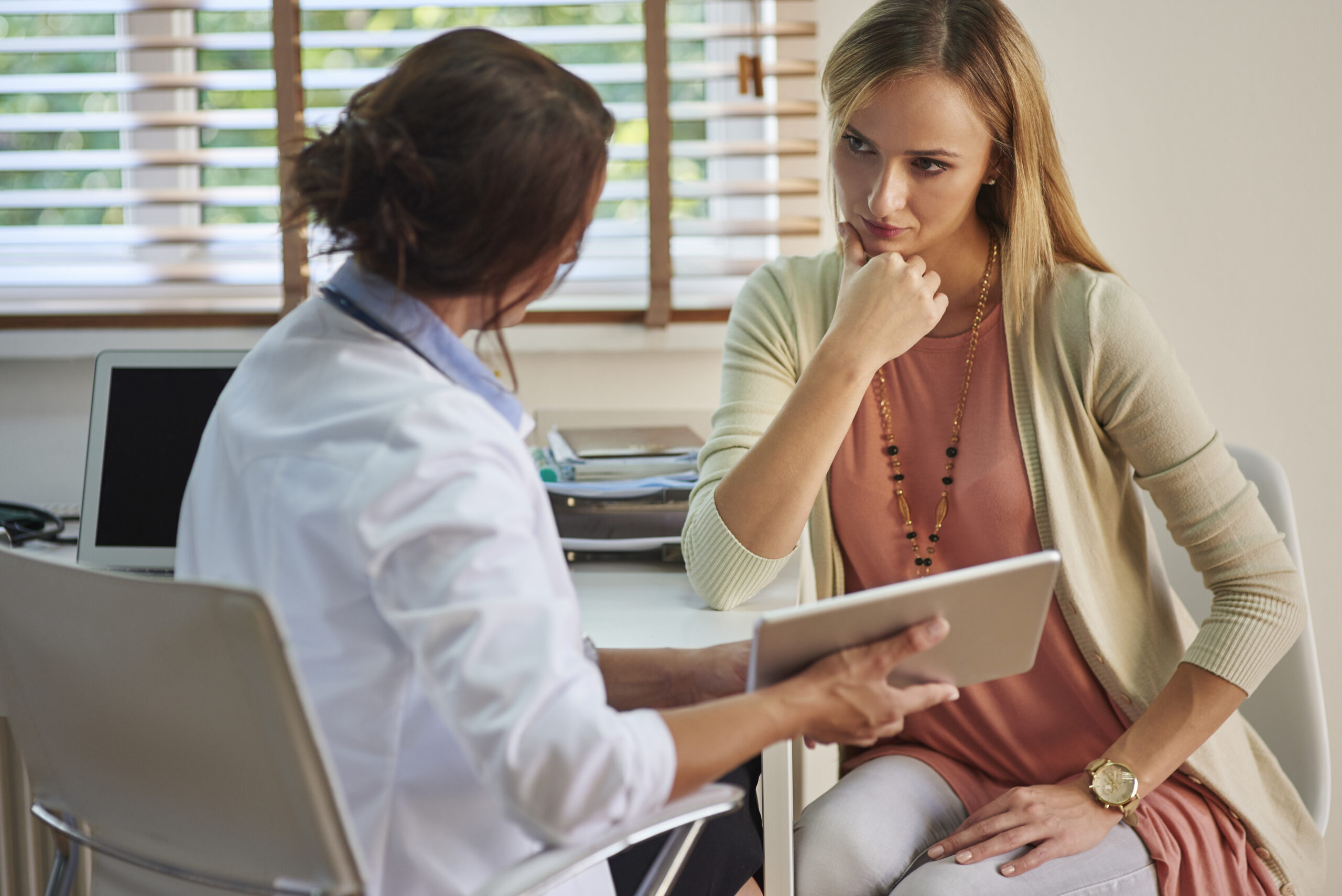 Woman in a consultation with her doctor
