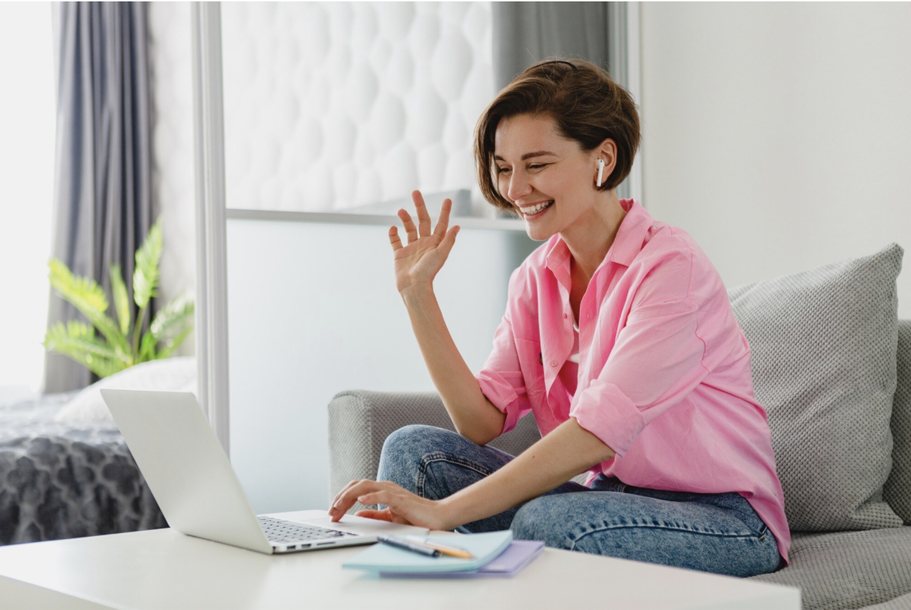 Woman in a secure online video consultation at home